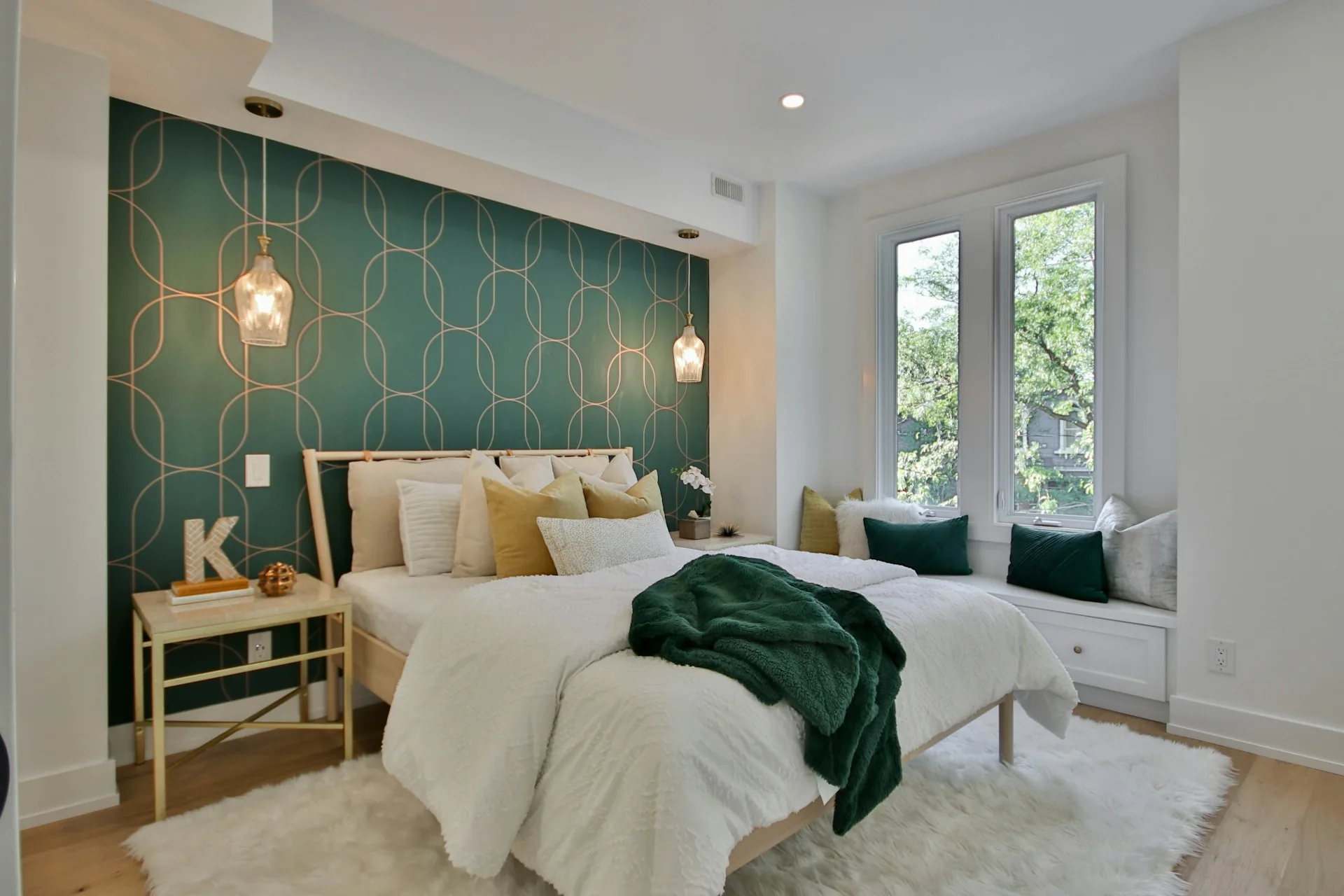 Bedroom with a green accent wall